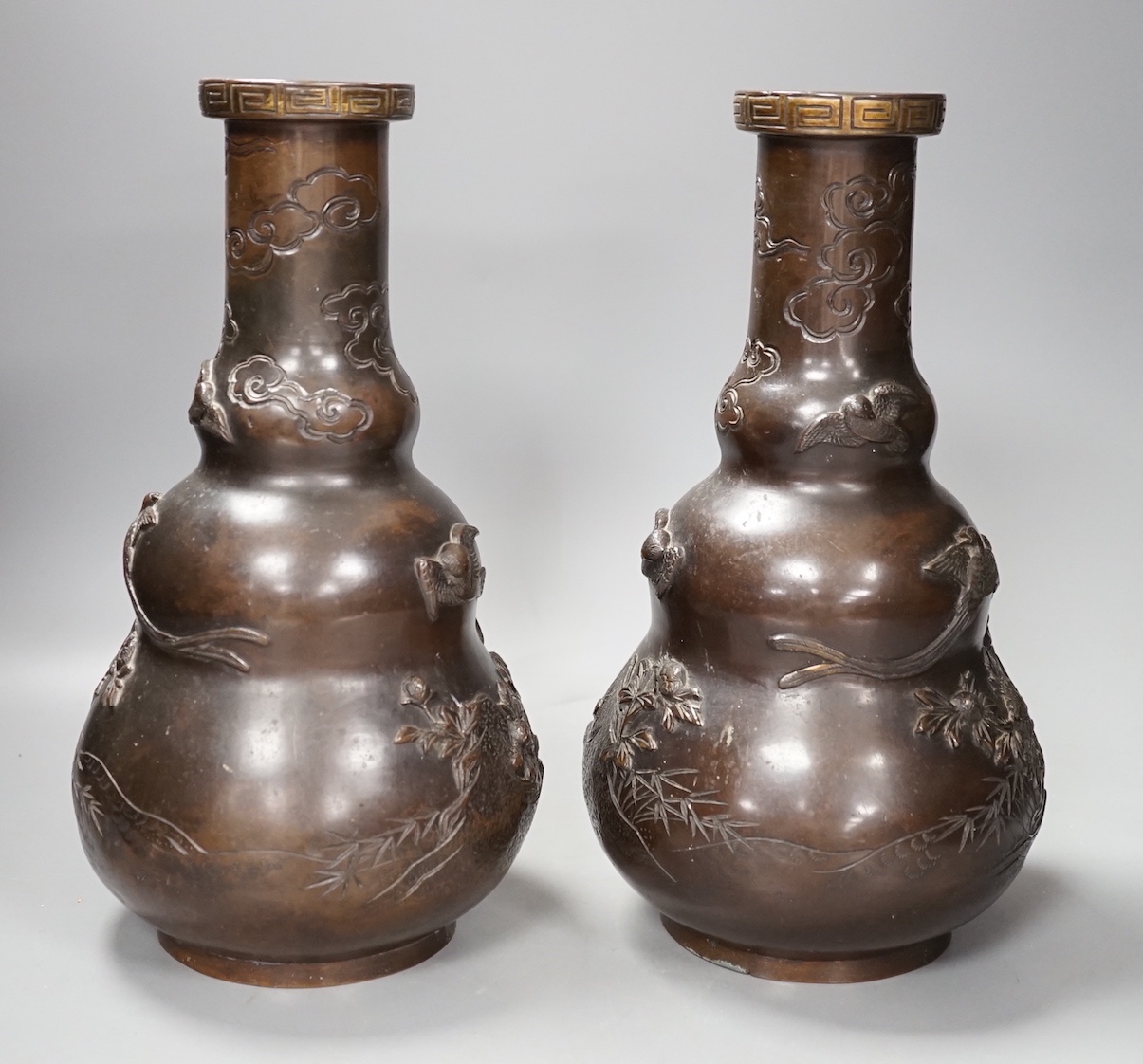 A pair of Japanese Meiji bronze vases. 30cm
